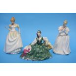 Three Royal Doulton ladies.