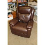 A Brown leather reclining armchair.