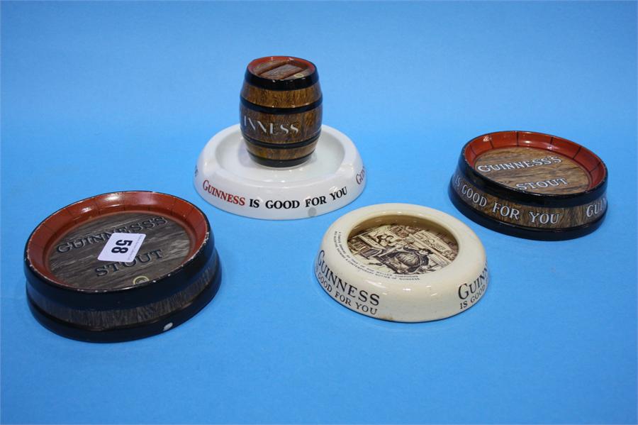 Four Guinness Advertising ashtrays.