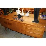 A teak sideboard.