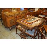 An oak Lees type six piece dining room suite.