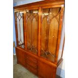 A yew wood display cabinet.