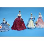 Three Royal Doulton figures of ladies and a Coalpo