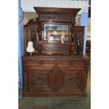 A Victorian heavily carved mirror back sideboard w