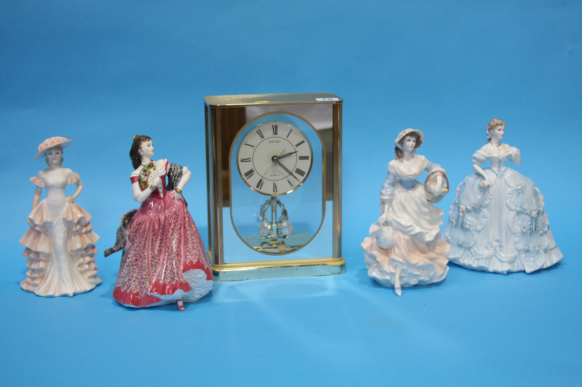 Modern Seiko clock and four figurines. - Image 3 of 9
