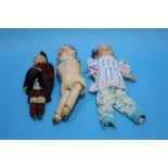 Two Continental Bisque porcelain headed dolls and