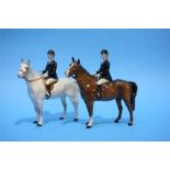 A Beswick Huntswoman on a grey horse and another o