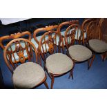 A set of four Ercol Windsor chairs.