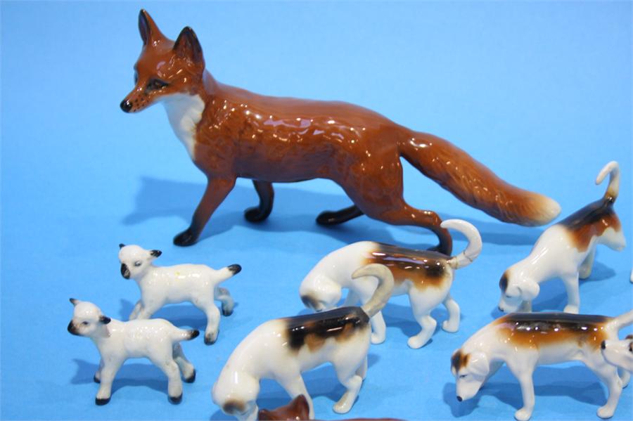 Two Beswick foxes and a collection of Hunting dogs - Image 4 of 5