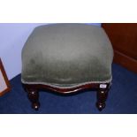 A modern square Victorian style foot stool.