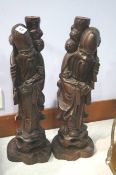 Pair of Rootman figurines