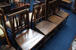 A set of four Country style dining chairs