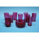 Eight Cranberry beakers, a cream jug and sugar bowl (10)