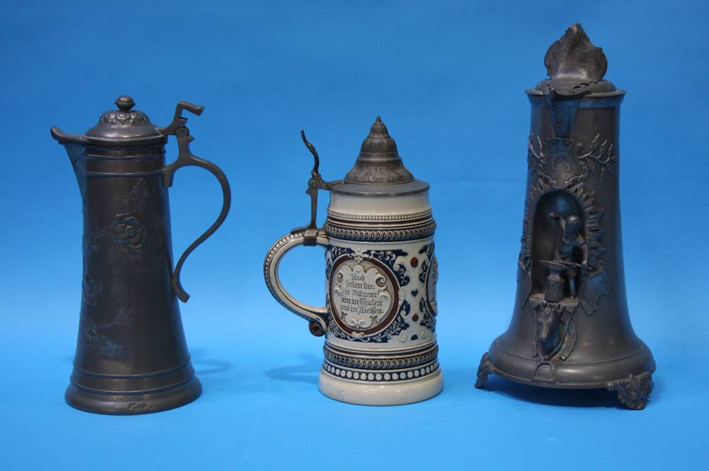 Two German Pewter Steins and a pottery Stein