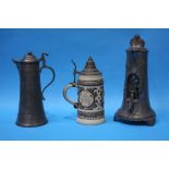 Two German Pewter Steins and a pottery Stein