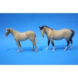 Two Beswick horses