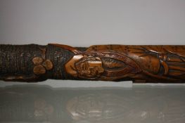 Carved Oriental bamboo walking cane