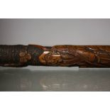 Carved Oriental bamboo walking cane