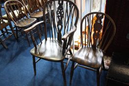 A Windsor wheelback carver and a single chair