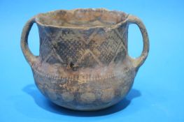 An early earthenware loving cup