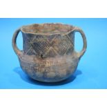 An early earthenware loving cup