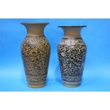 Two large earthenware vases with wide flared rims,