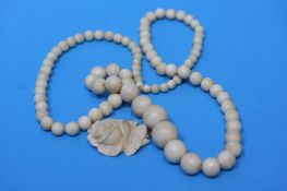 An ivory type necklace