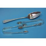 2 Pairs of silver sugar nips and a silver serving spoon