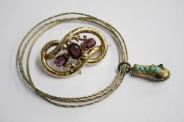 Gilt metal snakehead bangle and a brooch