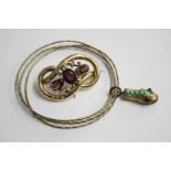 Gilt metal snakehead bangle and a brooch