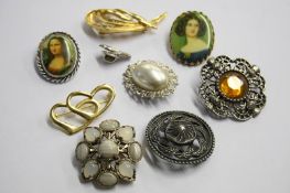Various brooches