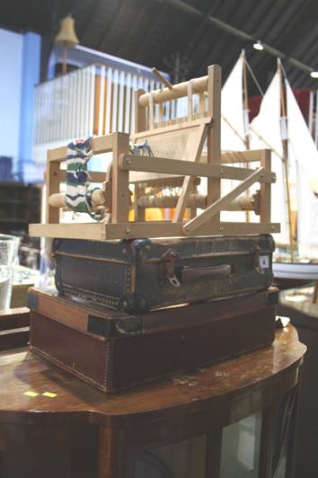 A Brio loom and 2 childs suitcases