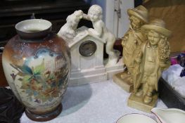 Various plaster figures and a glass vase
