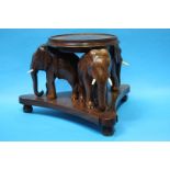 Carved Oriental hardwood elephant stand