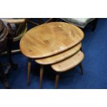 A set of Ercol Golden Dawn 'Pebble' nest of tables