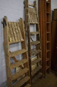 Two pairs of step ladders etc.