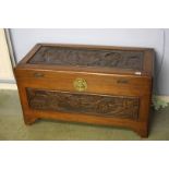 A carved Oriental Camphorwood chest