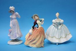 Two Royal Doulton figures and a Worcester figure