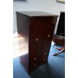 Reproduction mahogany oval coffee table and a HiFi cabinet