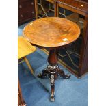 A Victorian mahogany circular top tripod table