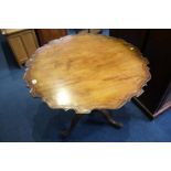 A good quality mahogany bird cage action, tripod table with pie crust top