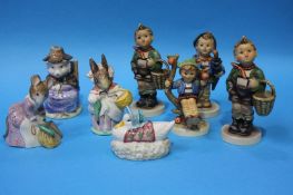 Four Hummel figures and four Royal Albert Beatrix Potter figures