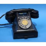 A converted Bakelite telephone, with cheese drawer