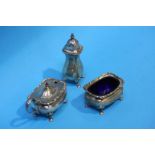 A silver three piece cruet set