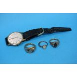A Gentlemans 9ct gold 'Accurist' wrist watch, two 9ct gold gentlemans rings and a 9ct Opal ring;