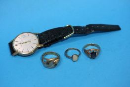 A Gentlemans 9ct gold 'Accurist' wrist watch, two 9ct gold gentlemans rings and a 9ct Opal ring;