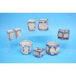 A collection of Chinese blue and white miniature lattice work sided pots (8)