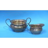 A silver sugar bowl and cream jug, Sheffield 1881 makers mark, weight 471 grams / 15.1 oz