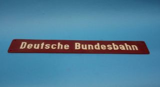 A 'Deutsche Bundesbahn' name plate and a German Federal Railway booklet (2)