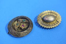 Two Victorian gilt metal mourning brooches